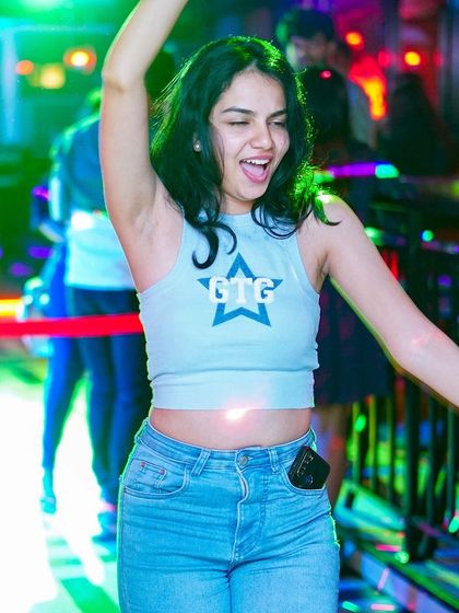 A partygoer enjoying the music during one of my Saturday Club Nights at Drava Koramangala. Capturing these moments of pure joy is what makes it all worthwhile.