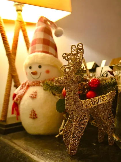 Even the smallest details matter. We placed festive figurines like this snowman and reindeer around the restaurant to complete the Christmas theme.