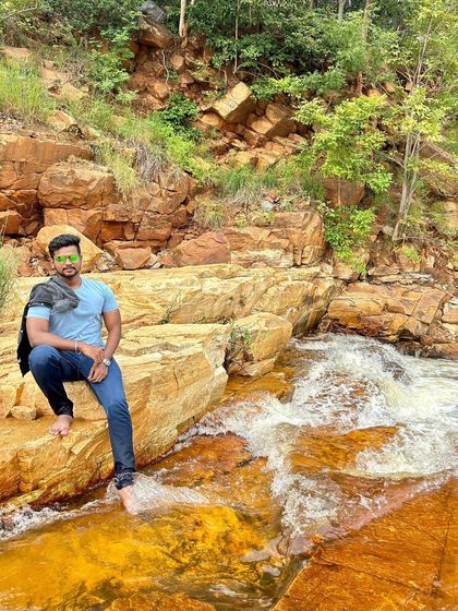 A candid moment enjoying the water at this scenic spot.