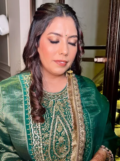 A close-up of the eye makeup, which is soft, neutral, and perfect for an elegant day event.