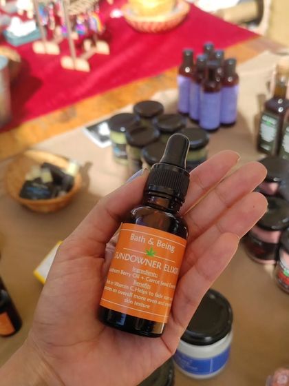 Holding our 'Sundowner Elixir' at the market. These events are the perfect opportunity to showcase new and favorite products.