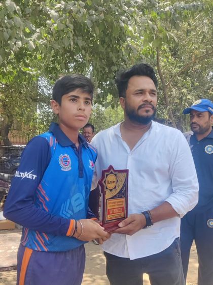 This player's focus and determination during the tournament earned him this winner's plaque.