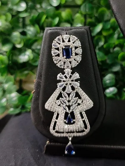 Another view of the earring from the popular sapphire-blue AD set, perfect for a glamorous evening look.