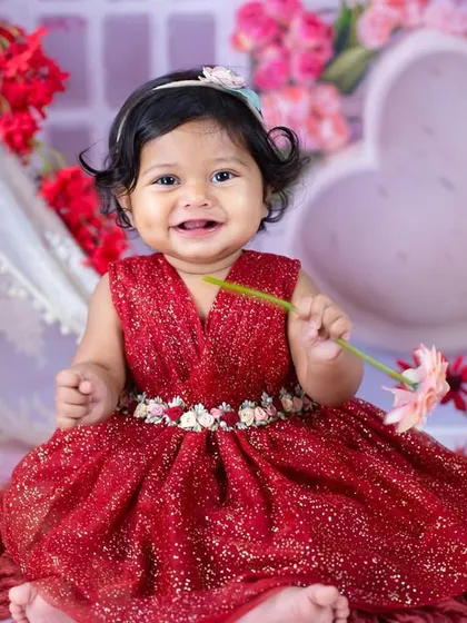 A bright and happy smile from this little darling. Her joy is absolutely infectious.