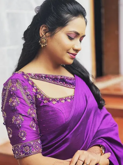 It's all in the details. This close-up shows the exquisite embroidery on one of my designer rental blouses, which you can pair with your own saree for a unique look.