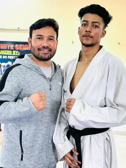 A moment with a senior coach and our student Rajat Kashyap during a special training seminar.