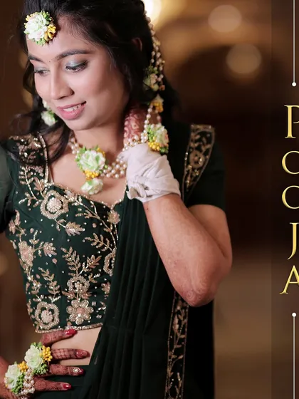 A beautiful portrait of the bride during her Mehendi ceremony, adorned with floral jewelry.