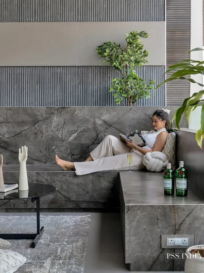 Your home should be a sanctuary, and that includes your outdoor spaces. I styled this modern marble deck with soft, knitted cushions and sculptural decor to create a chic yet comfortable lounge area for relaxing with a book or enjoying a drink with friends.