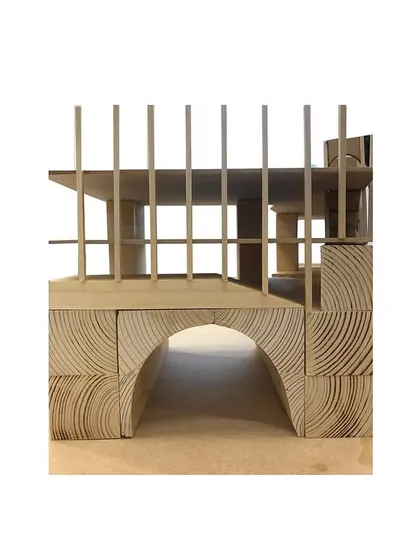 A conceptual model exploring the use of arches and a vertical grid structure. This hands-on process allows us to explore unexpected forms and material combinations.
