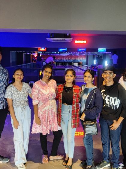 A group of young friends enjoying their time at The Grid.