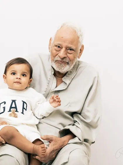 There's a special kind of quiet love in a photograph that spans generations. Capturing a baby with their grandparents is one of my favorite things; it’s a portrait of family history and a legacy of love.