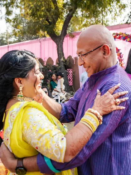 A father's love and blessings during a pre-wedding ceremony. These are the priceless, emotional moments we cherish.