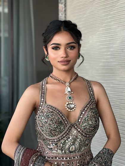 A closer look at the Mehendi makeup. The eyes are softly defined, and the skin is glowing, perfect for a day of celebration.