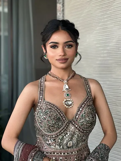A closer look at the Mehendi makeup. The eyes are softly defined, and the skin is glowing, perfect for a day of celebration.