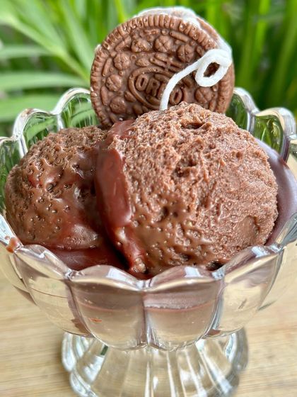 My Chocolate Ice Cream Sundae soy candle, complete with a wax Oreo biscuit. It's fragranced with rich chocolate, so it smells just as good as it looks.