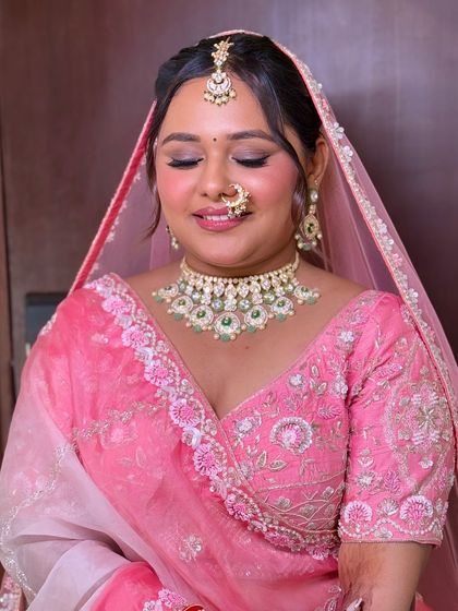 A close-up showcasing the soft, blended eyeshadow and the overall rosy glow of this bridal look. It's all about looking fresh and feeling beautiful.