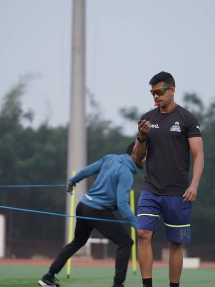 Observing the final phase of a resisted sprint. My focus is on ensuring the athlete maintains good posture and drive, even under fatigue.