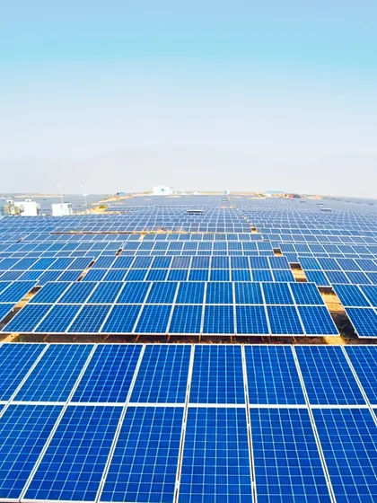 A wide shot of the solar arrays at Project Nayaka. This plant demonstrates our capability to deliver large-scale projects that cater to the growing energy needs of businesses nationwide.
