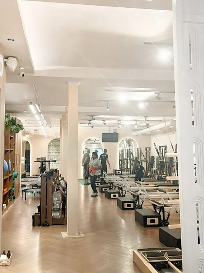 A look into our expansive studio, where cleanliness and order are paramount. The open layout provides ample space for movement, whether in a group class or a private session.