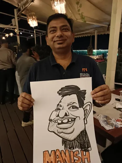 This guest's caricature captures his expression perfectly. It was a fun night of drawing on the rooftop.