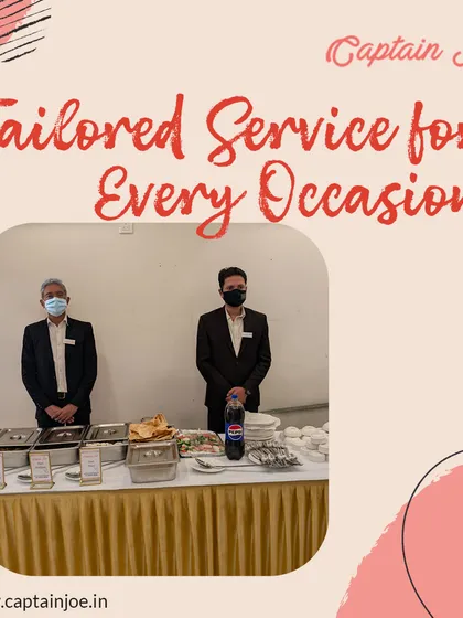 Our team provides tailored service for every occasion. Two of our masked servers stand ready behind a neatly arranged buffet table, showcasing our commitment to safety and professionalism.
