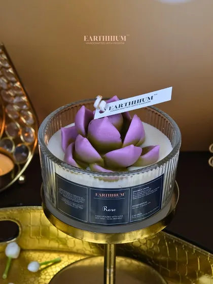 The lotus flower votive in a soft lilac hue, perfect for creating a serene and peaceful ambiance.