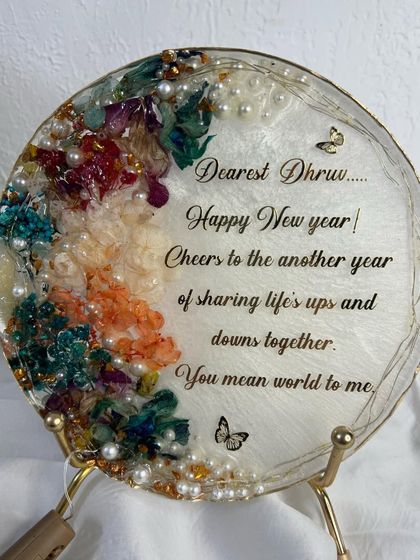 An 8-inch frame with a personalized New Year's message. The beautiful floral design and heartfelt words make this a wonderful and unique gift to start the year.