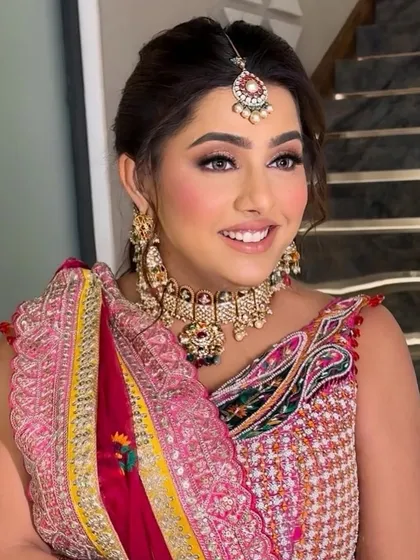 Another beautiful shot of the festive look. The colors are rich and beautiful, and her smile is infectious.
