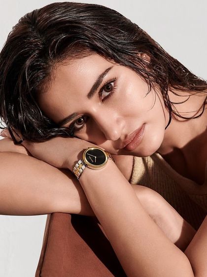 A close-up makeup look for a Calvin Klein watch campaign with Disha Patani. The focus here is on a natural, wet-look hair and dewy skin to create a fresh and modern feel.