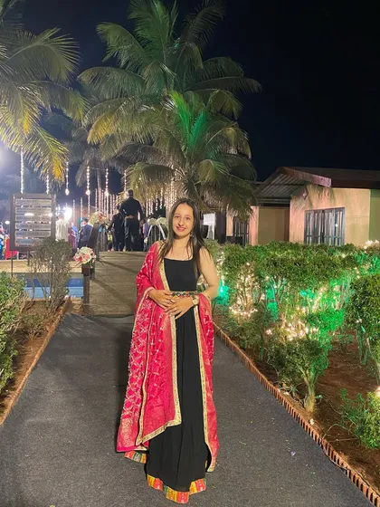My "desi girl" look for a destination wedding in Lonavala. A simple black outfit paired with a vibrant pink dupatta.