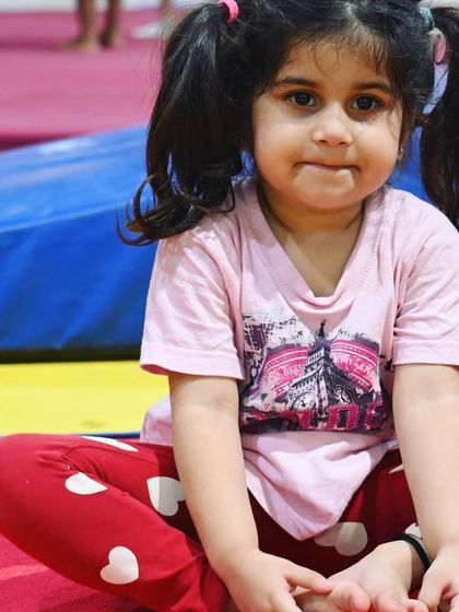 A quiet moment of focus. Our classes balance high-energy activities with calm, focused exercises to improve concentration.