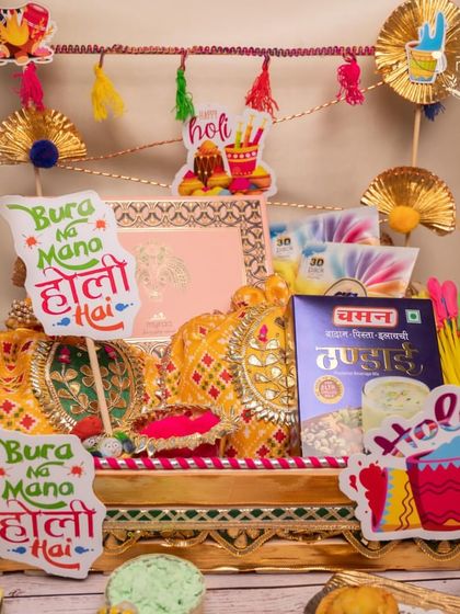 A fun and festive Holi hamper with "Bura Na Mano Holi Hai" signs, perfect for gifting to friends and family to get into the spirit of the festival.