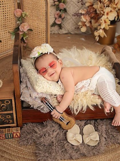 A little bit of sunshine with a cool pair of shades. This playful shot within a boho-themed setup shows how we can add a touch of fun to any style.