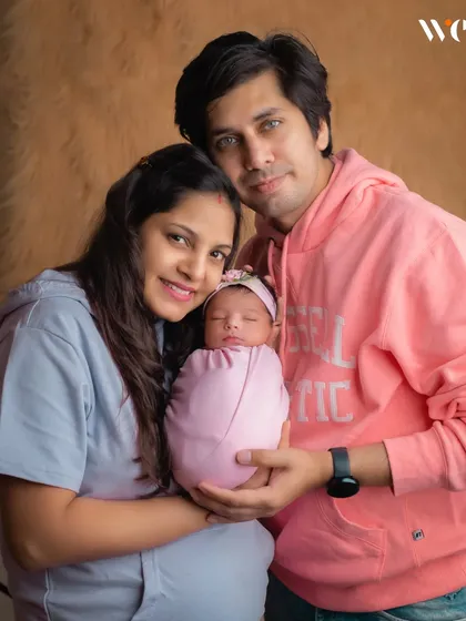 The first family portrait is a priceless memory. We always make time during our newborn sessions to capture the new parents holding their baby, marking the beginning of a new chapter.