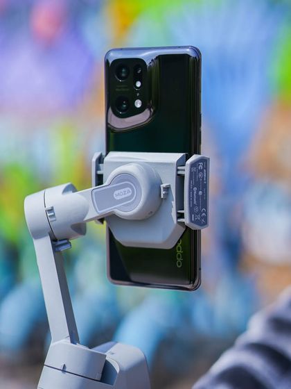 This image showcases the Oppo Find X5 Pro mounted on a MOZA gimbal. It highlights how I integrate different pieces of technology to achieve smooth, professional video content for brands.