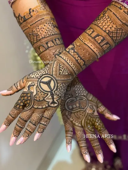 For the bride who loves luxury cars, we added a fun and unexpected element to her mehendi: the iconic Mercedes-Benz logo. No request is too creative.