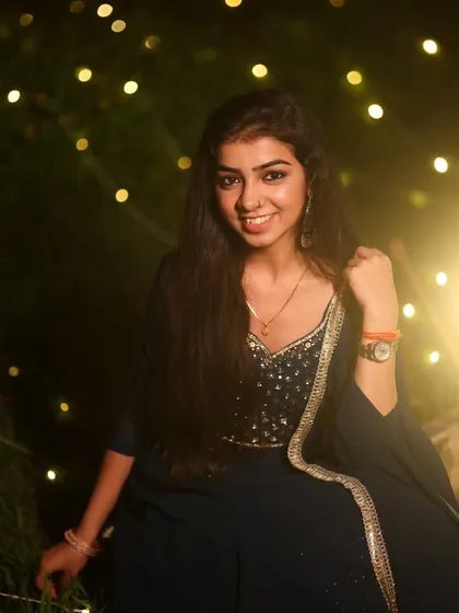 'Piya tose naina laage re'. A beautiful candid shot against a backdrop of fairy lights.
