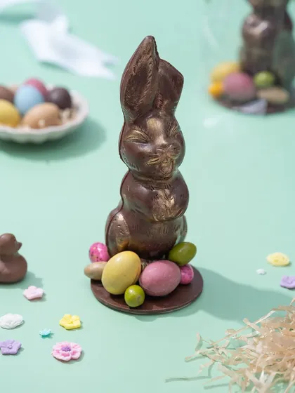 My classic Belgian chocolate Easter bunny, surrounded by mini chocolate eggs. This timeless treat is a must-have for any Easter celebration.