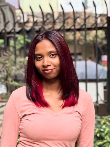 A front view of the Vino color. The peekaboo red adds a playful and edgy touch to the sophisticated wine shade.