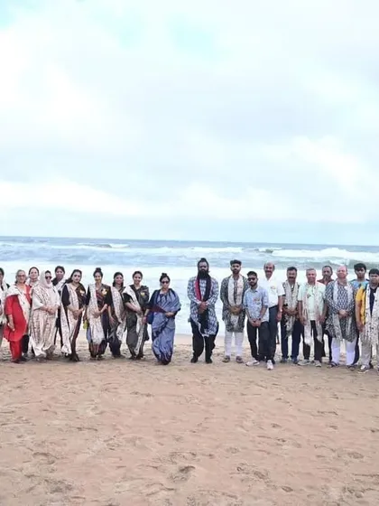 Another beautiful group photo on the beach in Puri, capturing the collective joy and camaraderie of our spiritual family on this sacred journey.