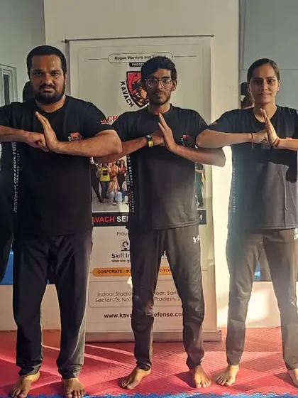 A group of newly certified instructors welcomed into the Kavach family, their bonds forged in sweat and trust.
