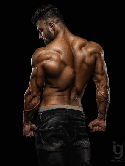 A crafted back. This professional photo shows the detail and muscularity that comes from years of dedicated training.