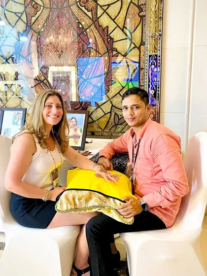 Me with a happy client. For me, mehndi is not just business, it's about connecting with people on their special days. This art is an 'ibadat' (worship), and I am grateful to share it.