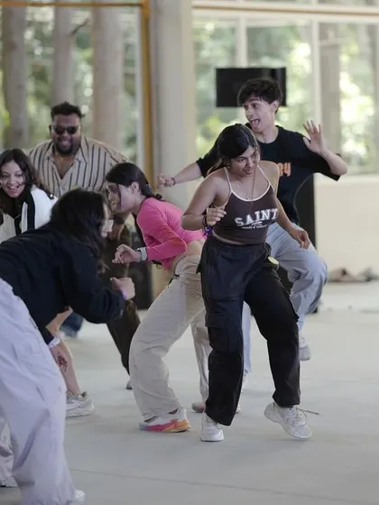 A group of dancers working on their choreography for Spectra.