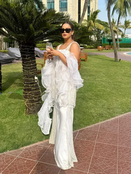 Ethnic wear and sunglasses are a power combination. A look from a wedding event in Kolkata.