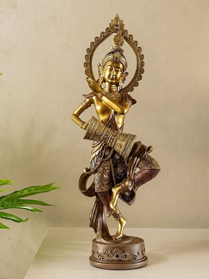 This resin showpiece depicts a celestial figure in a dynamic dancing pose with a drum. The antique bronze finish and intricate details on the clothing bring a sense of divine rhythm and grace to your decor.