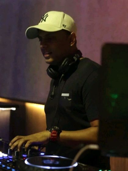 In the zone at Maize and Malt, one of my favorite clubs with an amazing sound system. Focusing on the mix, I'm lining up the next track to keep the energy flowing.