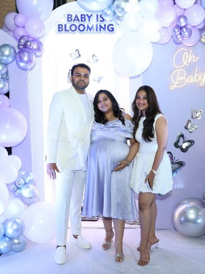 The parents-to-be with me, the planner! It brings me so much joy to stand with my clients in the beautiful spaces we create together.