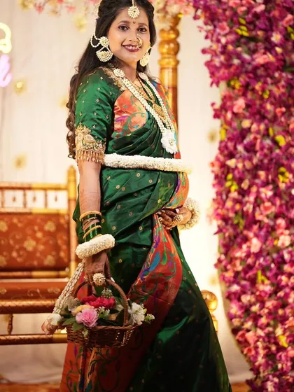 Our floral jewellery is not just for weddings. Here is a lovely mom-to-be glowing at her baby shower, wearing a custom floral set I made for her, including a delicate kamarband (waist belt) and matching wristlets.