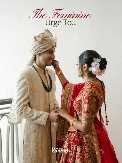 The feminine urge to... A sweet and playful moment where the bride lovingly adjusts something on the groom's face.